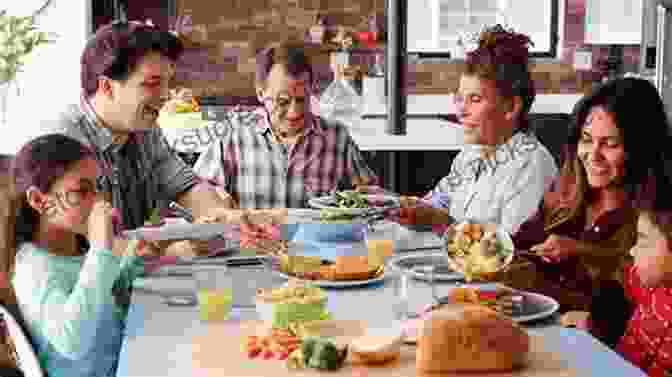 A Photo Of A Family Gathered Around A Dining Table, Sharing A Meal And Laughing Mama Dip S Family Cookbook Mildred Council