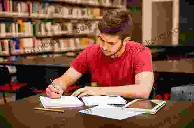 Student Working At A Desk With Books And Notes, Establishing Effective Study Habits Academic Success: A Student S Guide To Studying At University (Bloomsbury Study Skills)